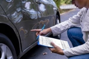 assess damage hail car repair fixing